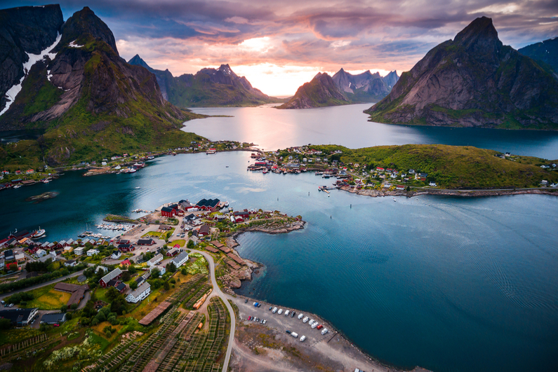 Lofoten islands is an archipelago in the county of Nordland, Norway, known for a distinctive scenery with dramatic mountains and peaks, open sea and sheltered bays, beaches and untouched lands.