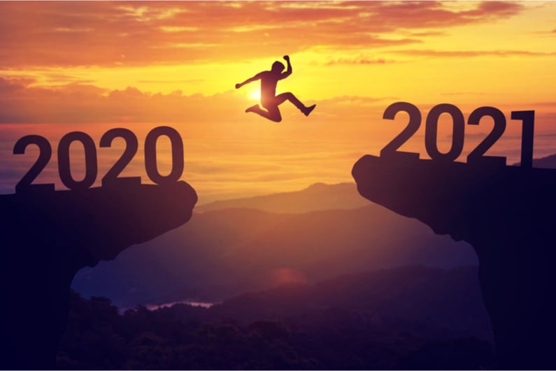 man jumping from 2020 to 2021